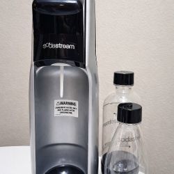 SodaStream Sparkling Water Maker + 2 Bottles | Works Great