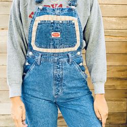 Vintage denim overalls 100 percent cotton Approximately Measurements Waist 14 inches Waist down 40 inches in length