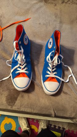 Chuck Taylor Converse All Stars.  See Details