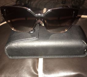 Original Prada ladies sunglasses with case.New never used