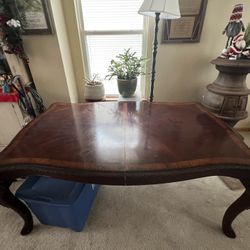 Brown and Cherry Dinning Room Table