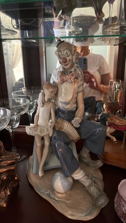 Lladro clown holding accordion with ballerina