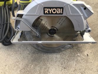 RYOBI 15 Amp Corded 7-1/4 in. Circular Saw with EXACTLINE Laser Alignment System, 24T Carbide Tipped Blade, Edge Guide and Bag