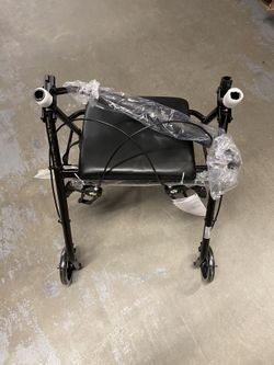McKesson Rollator Walker with Seat and Wheels, Lightweight, Aluminum, 300 lbs Weight Capacity, Black,