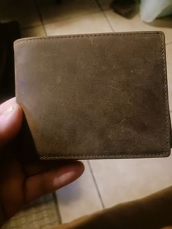 Brand new brown leather wallet has a beautiful saying inside