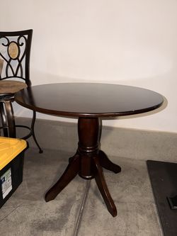 Round Dark Wood Pedestal Dining Table