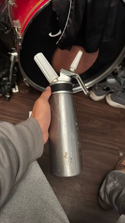 Whipped cream dispenser