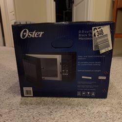 Unopened/New Oster 0.9cu Ft Microwave Oven