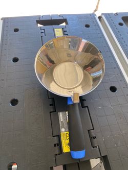 Stainless steel scoop.