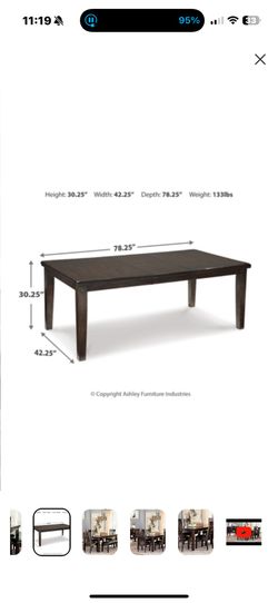 Extendable Dark brown dining table with four chairs and one couch, in very excellent condition.