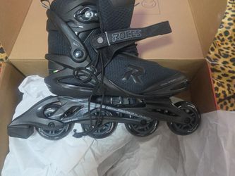 INLINE SKATES. new in box never worn, men's 11