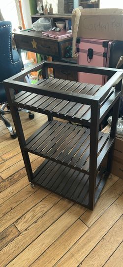 Three layer stand with wheels