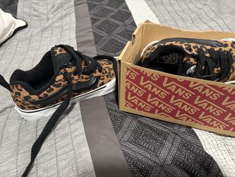 Knu school cheetah vans