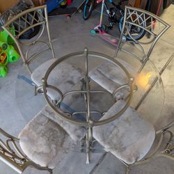45" Glad Top Dining Table and 4 Chairs. Additional $15 for Delivery.