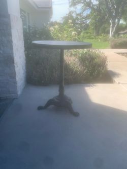 Solid wood side table wrought iron base