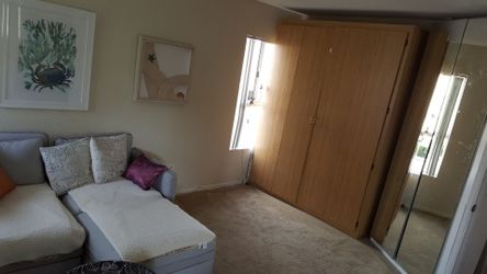 Murphy bed metal frame in beautiful white cabinets.