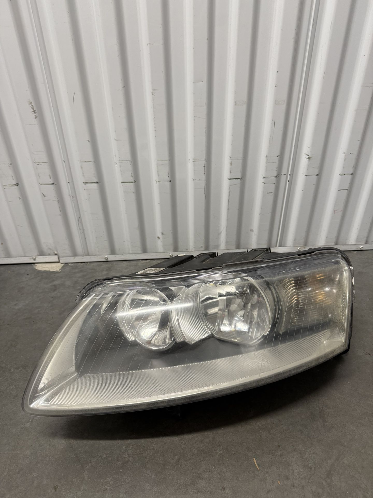OEM Audi A6 C6 (2005–2008) left (driver side) headlight assembly.