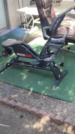 Health rider exercises bike