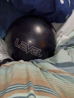 Storm Level Bowling Ball and iq tour emerald barely used level is 13lbs
