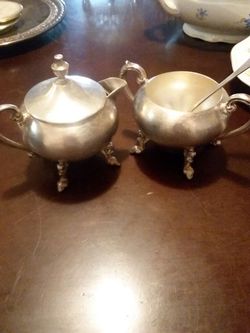 Silver on copper Milk and sugar containers