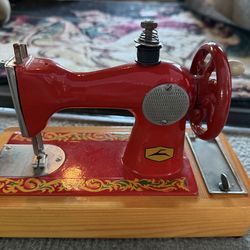 Vintage mini sewing machine