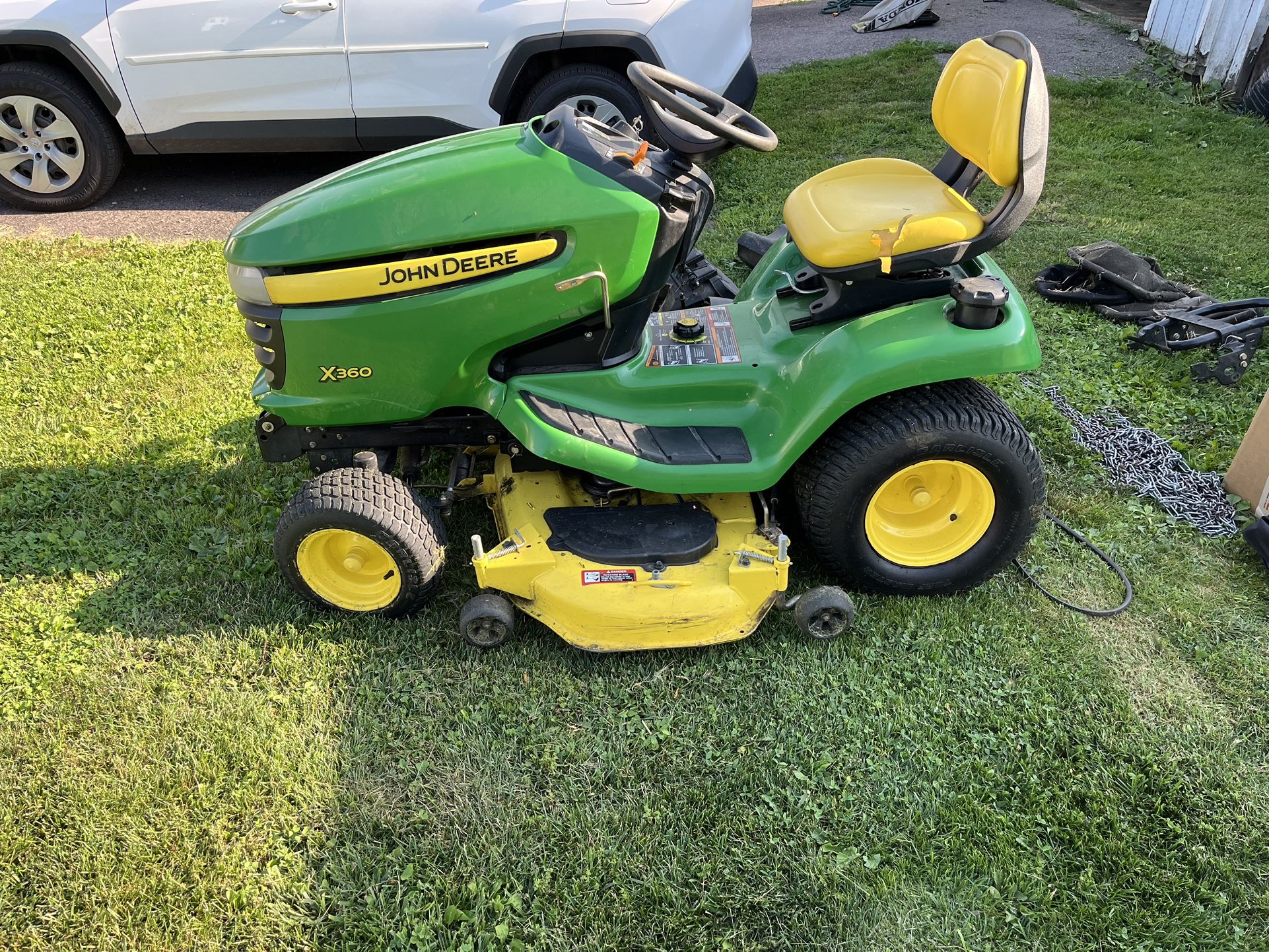 John Deere X360. Cab Snow Blower