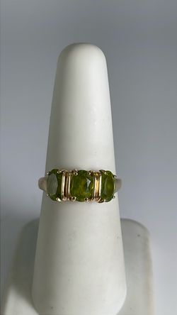 14k gold ring with green CZ