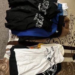 Lot Of Used Jackets, Sweaters, And Shirts