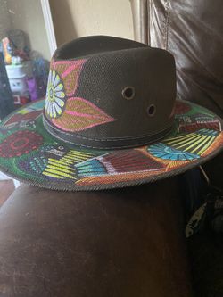 New, never used hand painted hat from Mexico