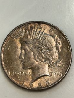 1923 Almost Uncirculated Peace Dollar Coin