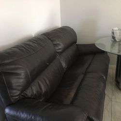 Two Dark Brown Leather Recliner Sofas