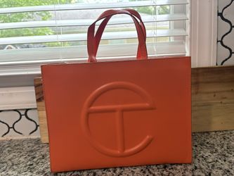 Orange Tel Far Bag.