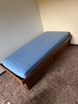 Twin bed with solid wood frame