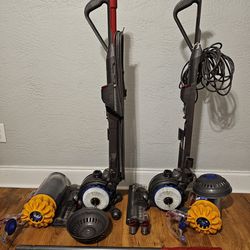 TWO Dyson DC40 working Vacuums