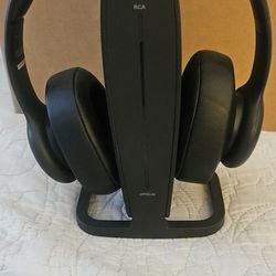 Insignia RF Wireless Over-the-Ear Headphones with their charging and transmitter dock