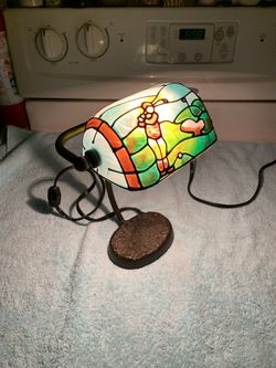 Small desk lamp. Golf Tiffany style glass