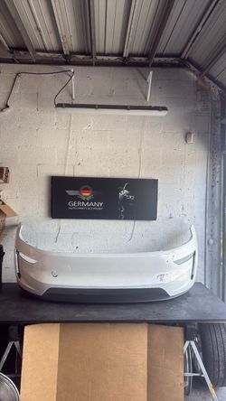 Tesla model Y 2027 front. Bumper & spoiler