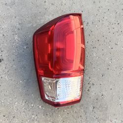 2016 - 2021 TOYOTA TACOMA LH DRIVER SIDE TAILLIGHT OEM