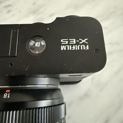 Like new Fuji X-E5 and 18mm 1.4 lens.