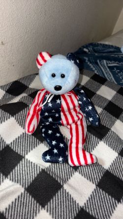 Spangle the Bear, a patriotic American flag-themed Ty Beanie Baby released in 1999.