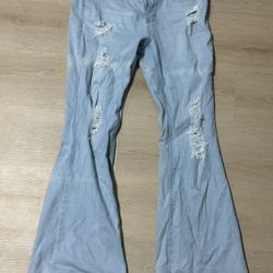 flare light wash ripped jeans 
