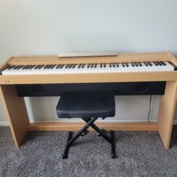 Roland F-100 Digital Piano. Like New.  Cash Only
