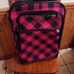 Gorgeous Red and black plaid Ricardo Beverly Hills 24 "tall rolling carry on luggage. PERFECT Condition. Handle adjustable to 2 different heights 10" 