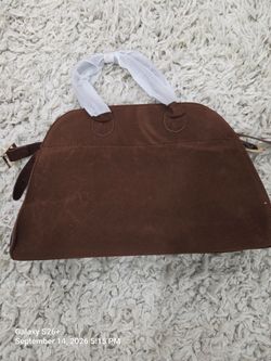 Brown Handbag with gold accessories