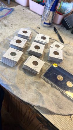 Two state Nichols one 1947 nickel and 69 wheat pennies 75