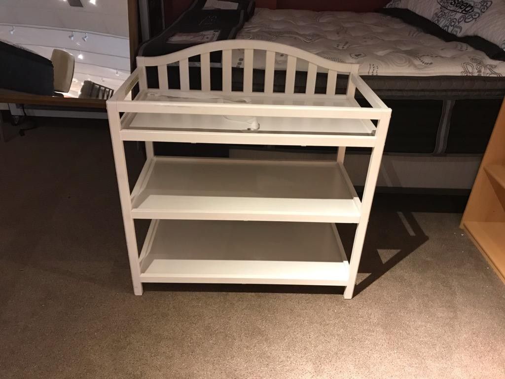 White wooden changing table