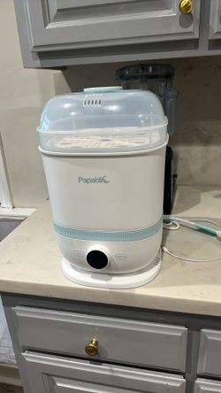 Baby bottle washer and steamer