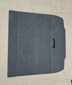 Audi TT trunk spare tire cover mat.