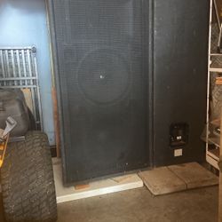 Two Speaker Cabinets With Two 15’ Ev’s