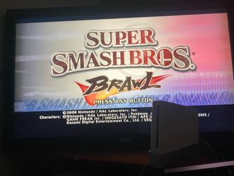 Nintendo GameCube-Wii Reverse Compatible Wii Super Smash Bros. Complete Ready 2 Play Bundle  Price: $140  🎮 Nintendo Wii & GameCube Gaming Bundle — C